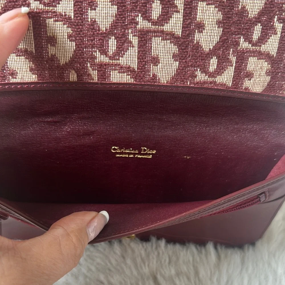 Dior Burgundy Wallet with Iconic Monogram Design